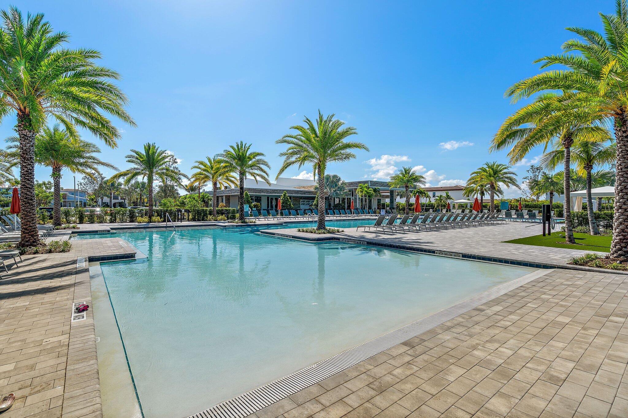 13364 Alton Road Palm Beach Gardens, FL 33418 - Photo 51 of 58 a view of swimming pool with outdoor seating and lake