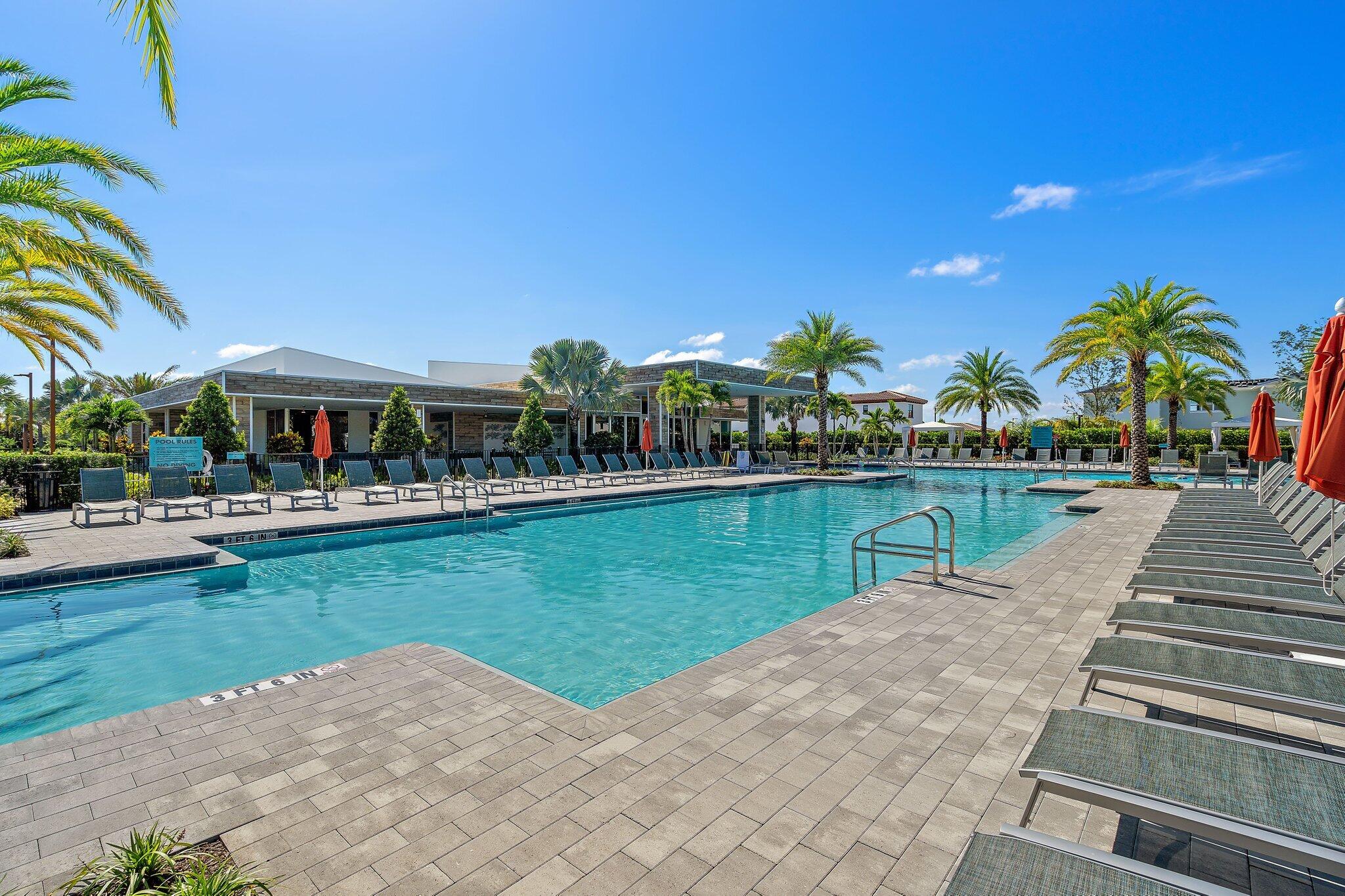 13364 Alton Road Palm Beach Gardens, FL 33418 - Photo 52 of 58 a view of a swimming pool with a patio