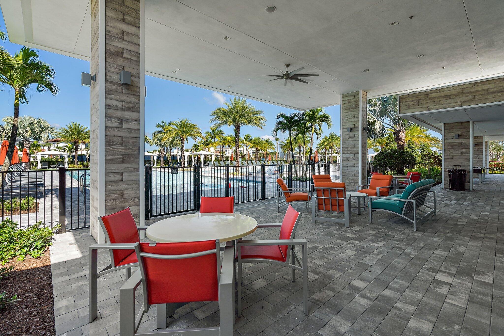 13364 Alton Road Palm Beach Gardens, FL 33418 - Photo 57 of 58 a outdoor space with lots of tables and chairs
