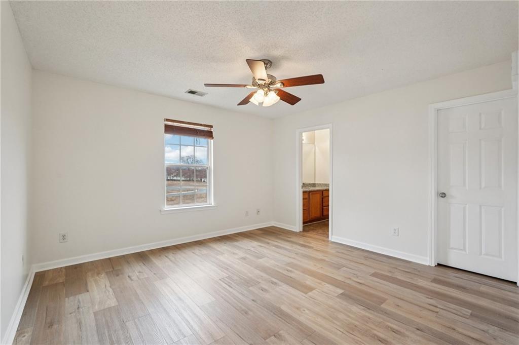 38 Middleton Court Cartersville, GA 30120 - Photo 23 of 46 a view of empty room with wooden floor and fan