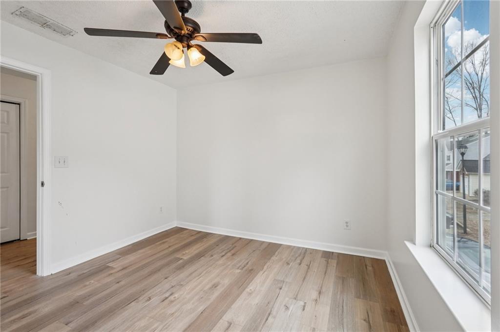 38 Middleton Court Cartersville, GA 30120 - Photo 30 of 46 a view of room with hardwood floor and ceiling fan