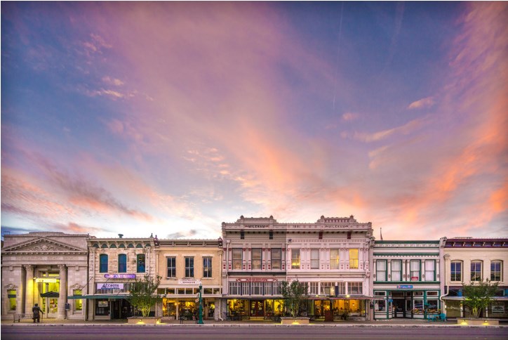 120 Fox Run Georgetown, TX 78628 - Photo 24 of 30 a front view of a residential apartment building with a yard