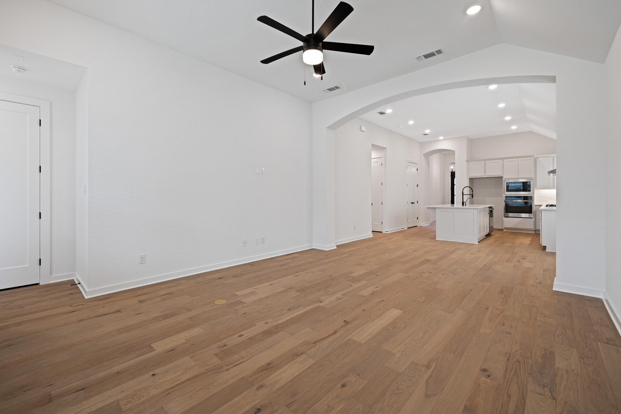 120 Fox Run Georgetown, TX 78628 - Photo 8 of 30 a view of a kitchen with a sink and a refrigerator