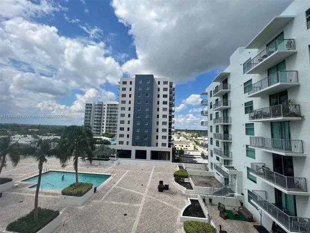 a view of yard with patio