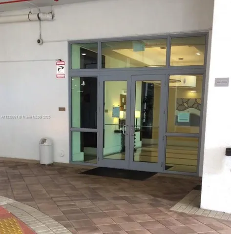 swimming pool view with a sitting space