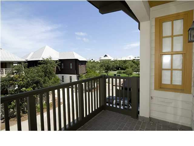34 The Lofts In Barrett Square, Unit 2E Rosemary Beach, FL 32461 - Photo 11 of 12 a black and white photo of a lake