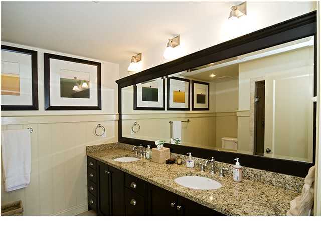 34 The Lofts In Barrett Square, Unit 2E Rosemary Beach, FL 32461 - Photo 8 of 12 a bathroom with a sink and a mirror