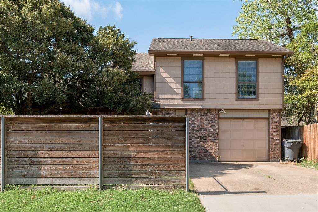 11136 McCree Road Dallas, TX 75238 - Photo 3 of 21 a view of a house with a yard