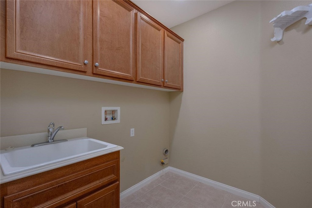 7692 Dutra Drive Hemet, CA 92545 - Photo 11 of 48 a room with storage and utility