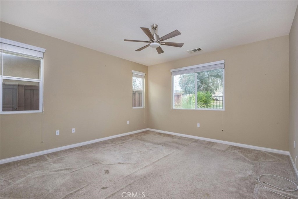 7692 Dutra Drive Hemet, CA 92545 - Photo 22 of 48 a view of an empty room with a window