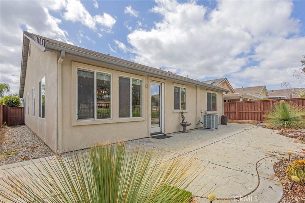 7692 Dutra Drive Hemet, CA 92545 - Photo 28 of 48 a view of a house with a patio