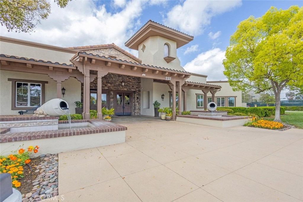 7692 Dutra Drive Hemet, CA 92545 - Photo 37 of 48 a view of a house with sitting area and a swimming pool