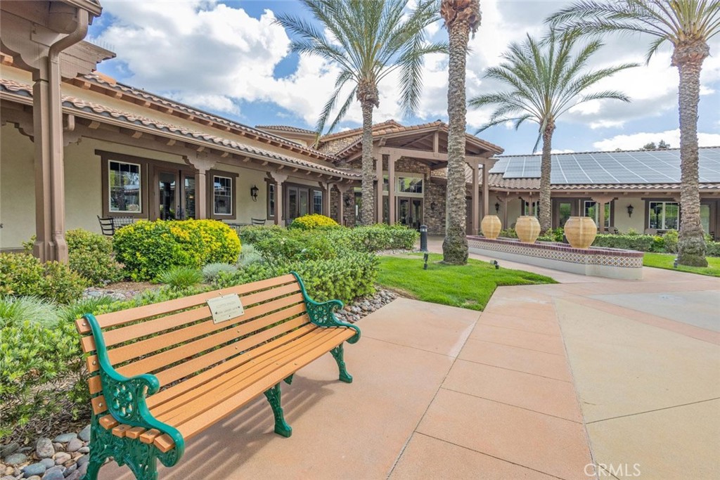 7692 Dutra Drive Hemet, CA 92545 - Photo 41 of 48 a front view of a house with a garden and plants