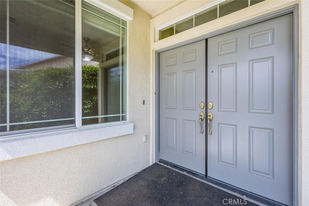 7692 Dutra Drive Hemet, CA 92545 - Photo 6 of 48 wooden floor and window in an empty room