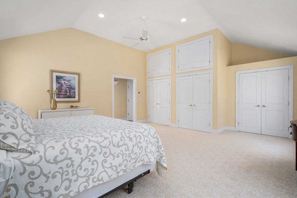22 Fox Run Road Sudbury, MA 01776 - Photo 19 of 42 a bedroom with a large bed
