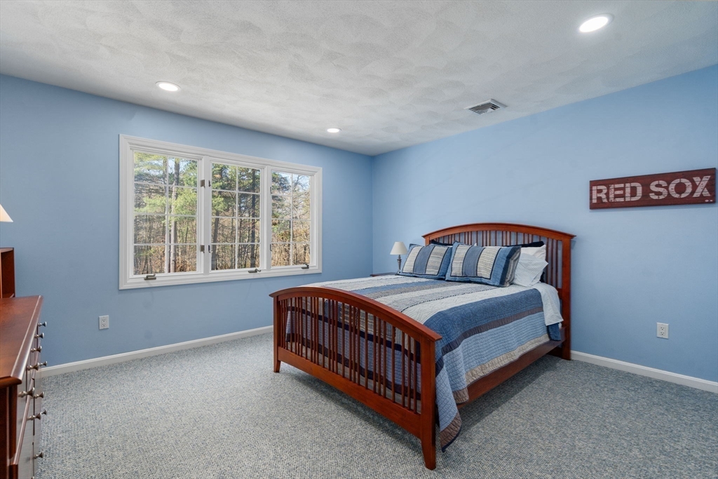 22 Fox Run Road Sudbury, MA 01776 - Photo 22 of 42 a bedroom with a bed and window
