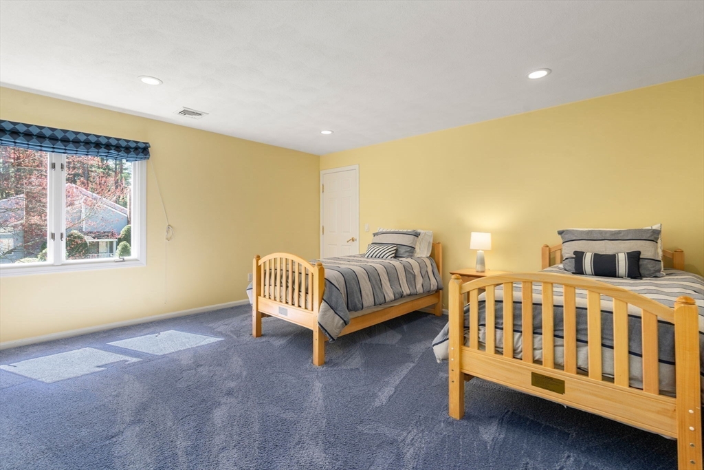 22 Fox Run Road Sudbury, MA 01776 - Photo 26 of 42 a bedroom with a bed and window