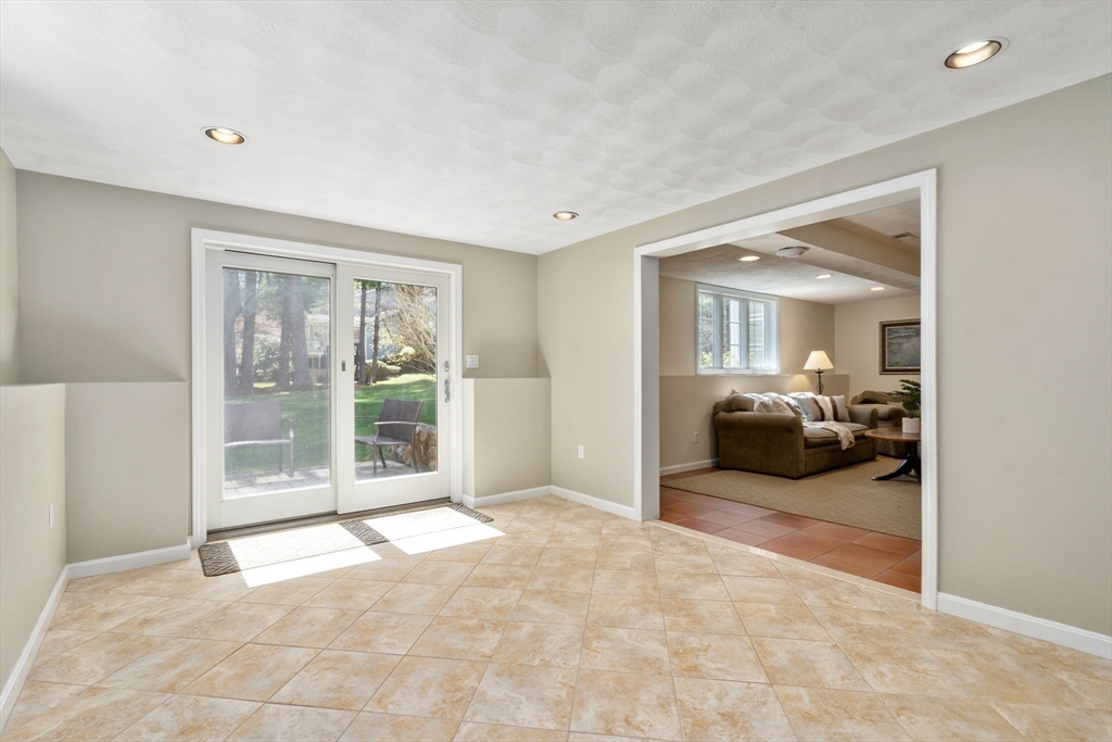 22 Fox Run Road Sudbury, MA 01776 - Photo 30 of 42 a view of a livingroom with a large window and couch