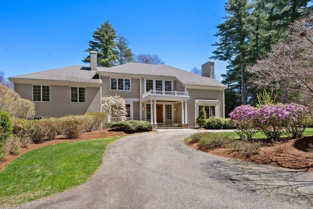 22 Fox Run Road Sudbury, MA 01776 - Photo 3 of 42 a front view of a house with a garden