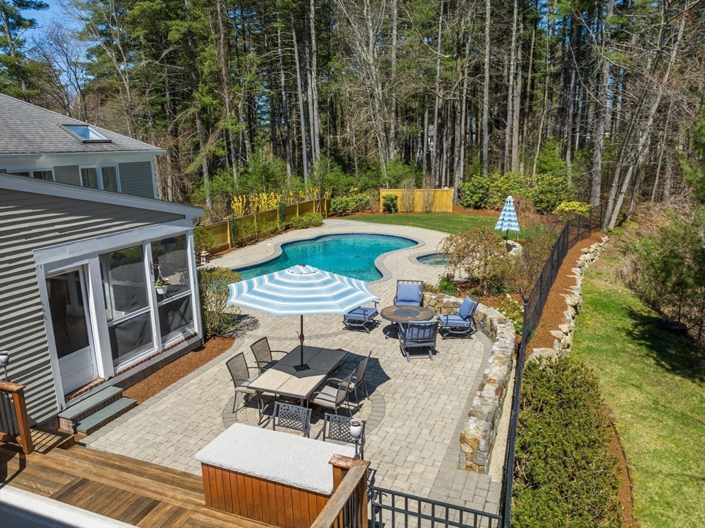 22 Fox Run Road Sudbury, MA 01776 - Photo 36 of 42 a view of a chairs and table in backyard of the house