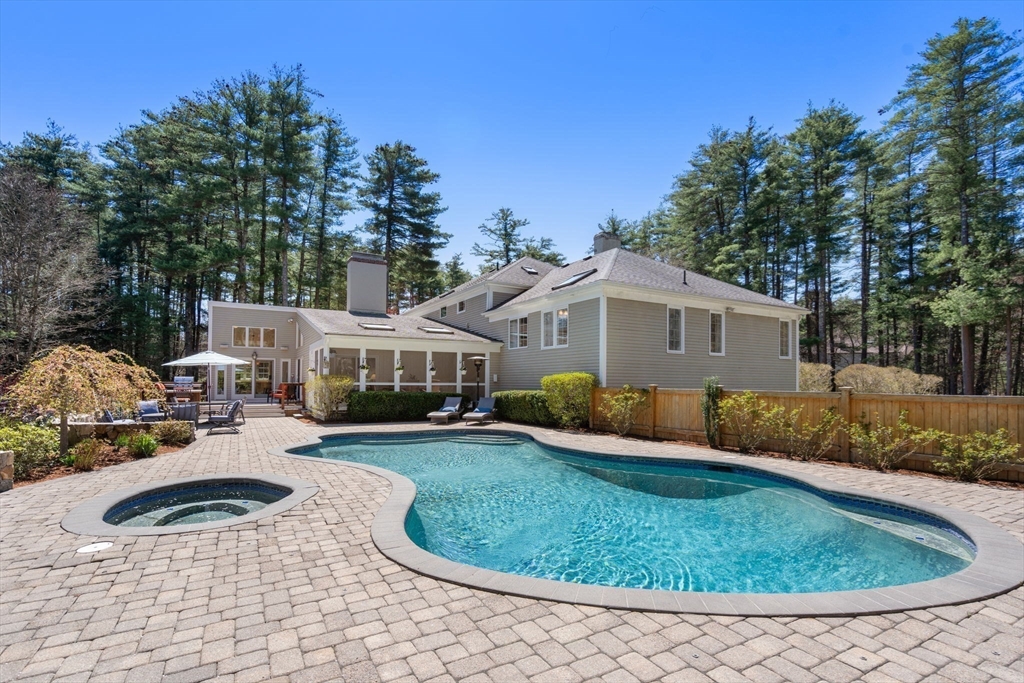 22 Fox Run Road Sudbury, MA 01776 - Photo 37 of 42 a view of a house with a yard patio and fire pit