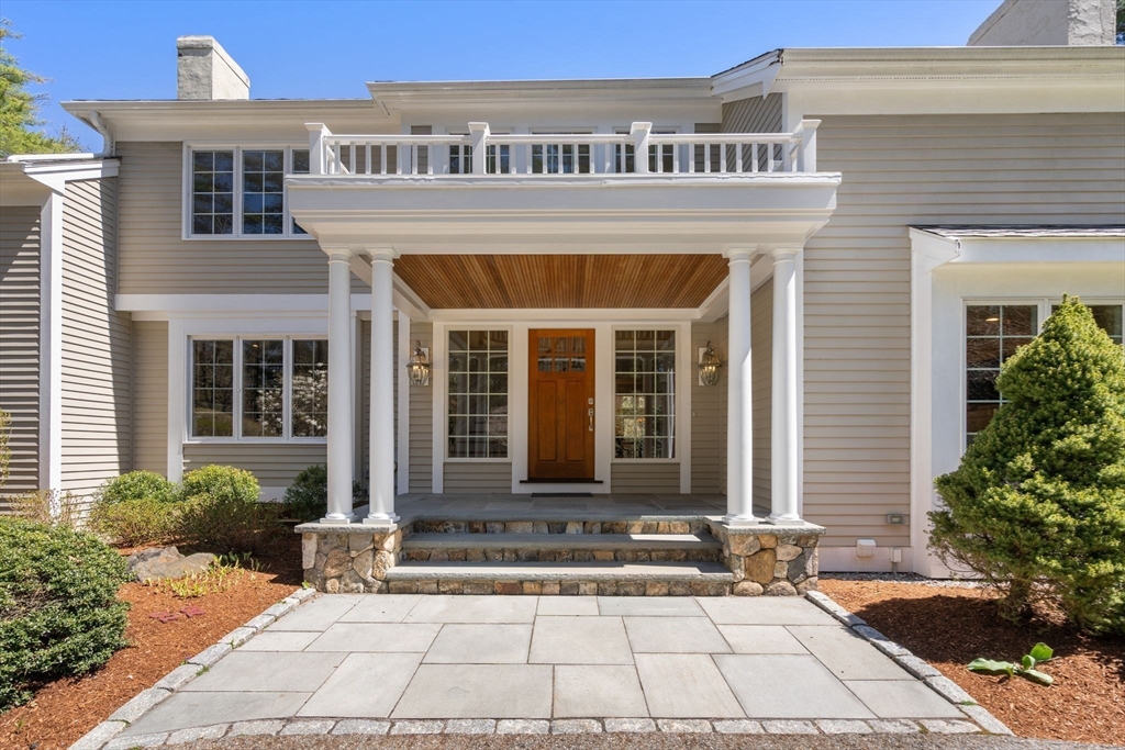 22 Fox Run Road Sudbury, MA 01776 - Photo 4 of 42 a front view of a house with a yard