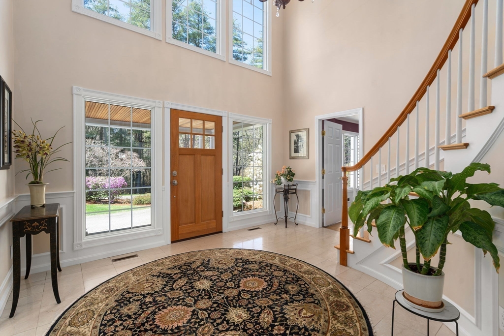 22 Fox Run Road Sudbury, MA 01776 - Photo 5 of 42 a living room with furniture and a potted plant