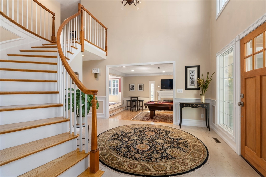 22 Fox Run Road Sudbury, MA 01776 - Photo 6 of 42 a view of a livingroom with furniture and staircase