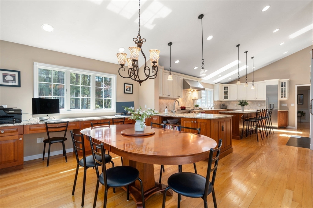 22 Fox Run Road Sudbury, MA 01776 - Photo 10 of 42 a dining room filled with furniture and wooden floor