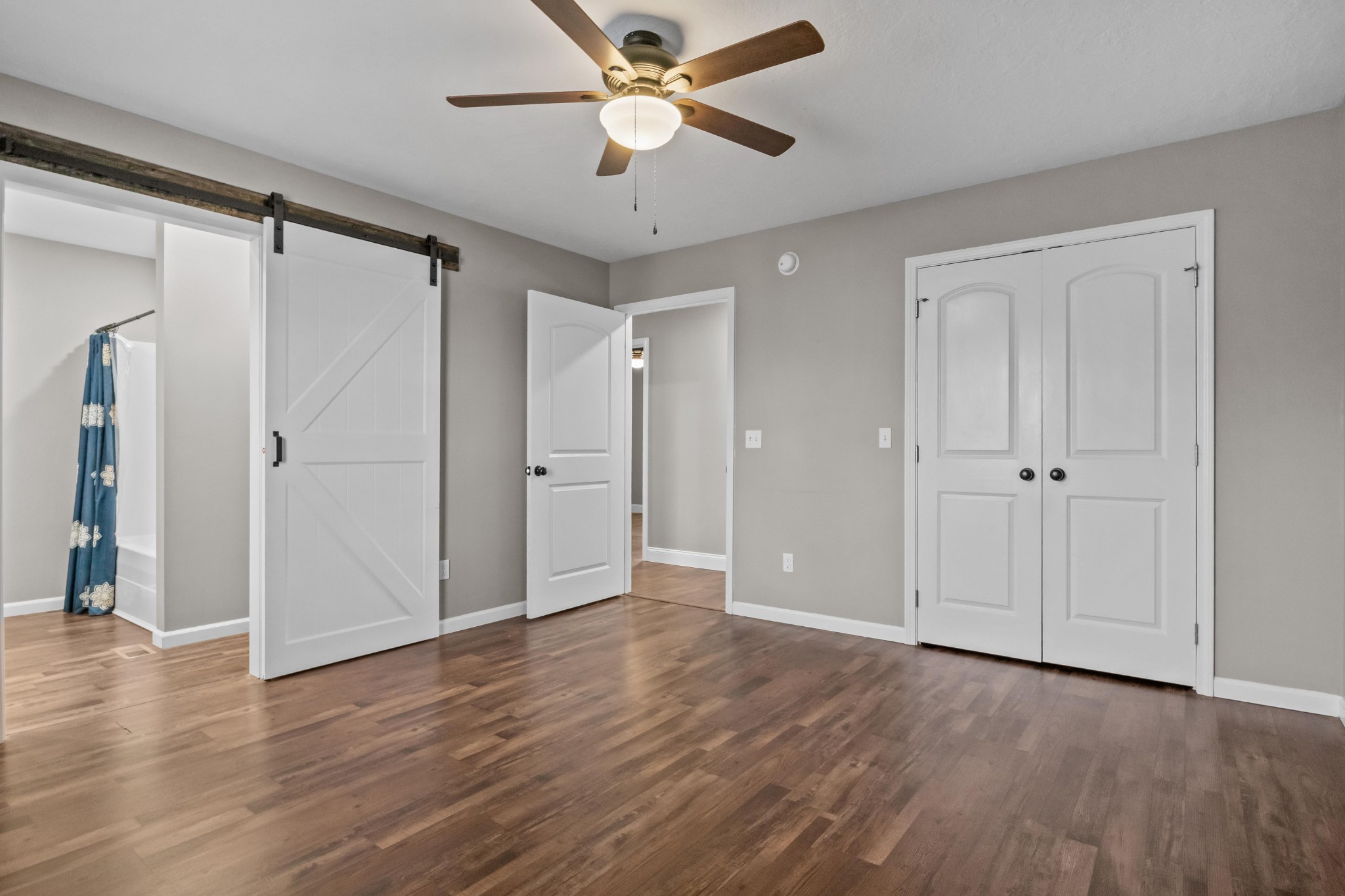 358 Able Street Big Sandy, TN 38221 - Photo 21 of 31 a view of an empty room and wooden floor