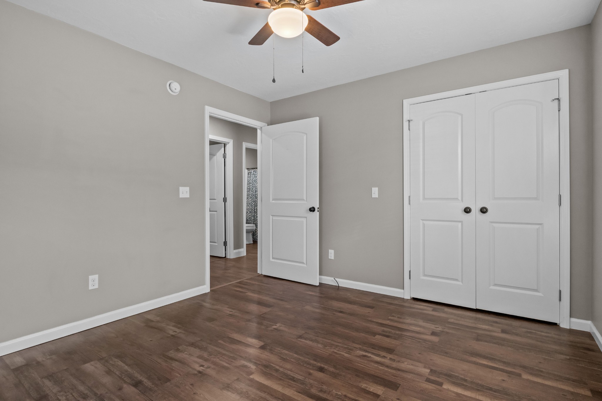 358 Able Street Big Sandy, TN 38221 - Photo 26 of 31 a view of an empty room with wooden floor