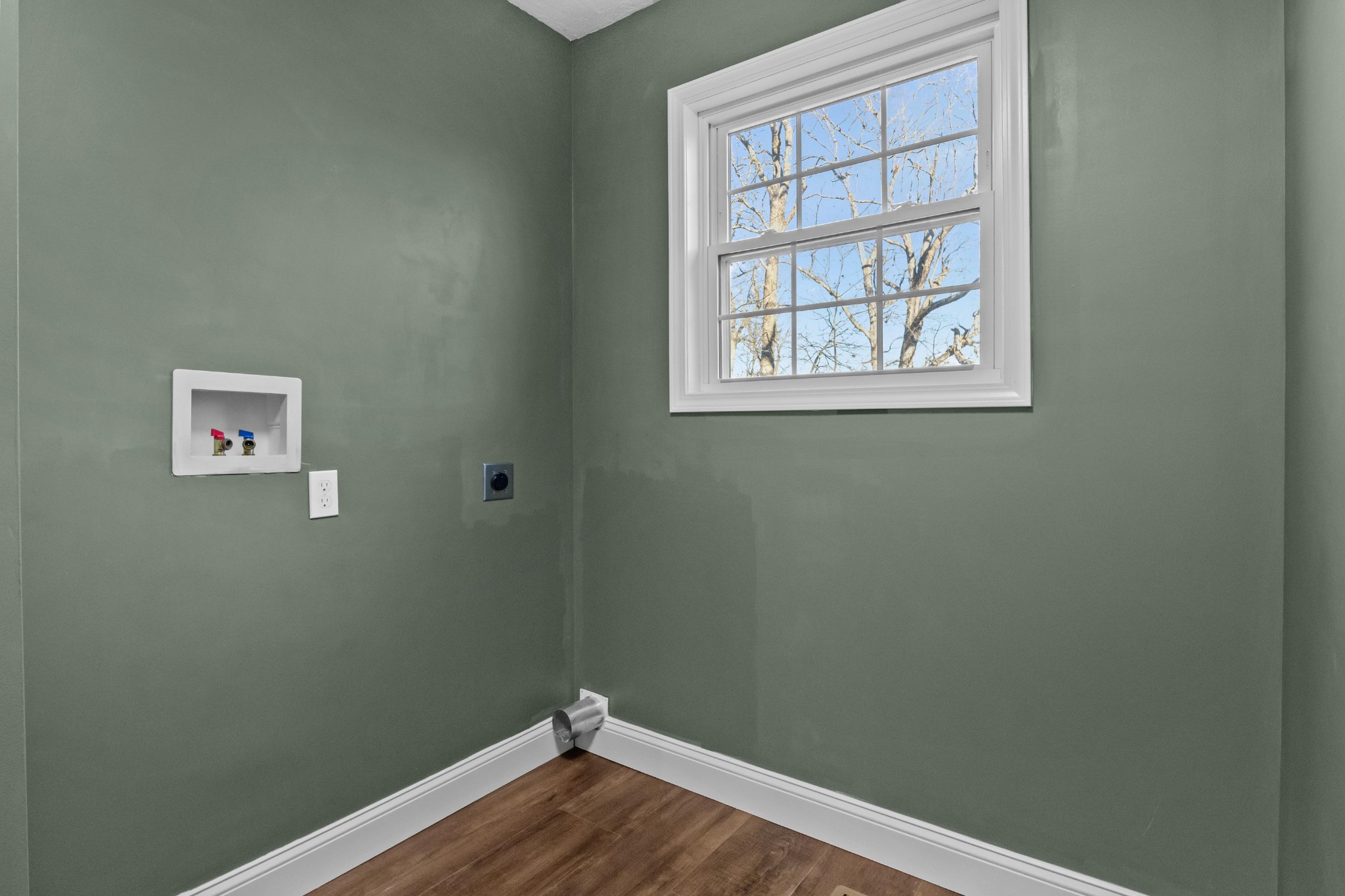 358 Able Street Big Sandy, TN 38221 - Photo 31 of 31 a view of a small space with wooden floor and a window