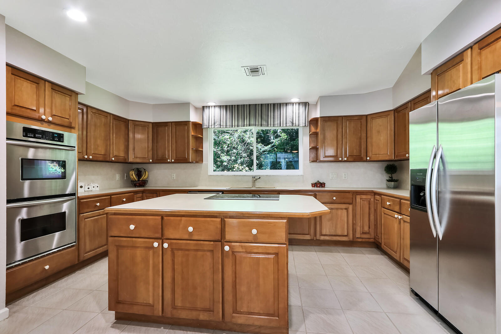 15094 Alexander Run Jupiter, FL 33478 - Photo 11 of 70 kitchen with bar area