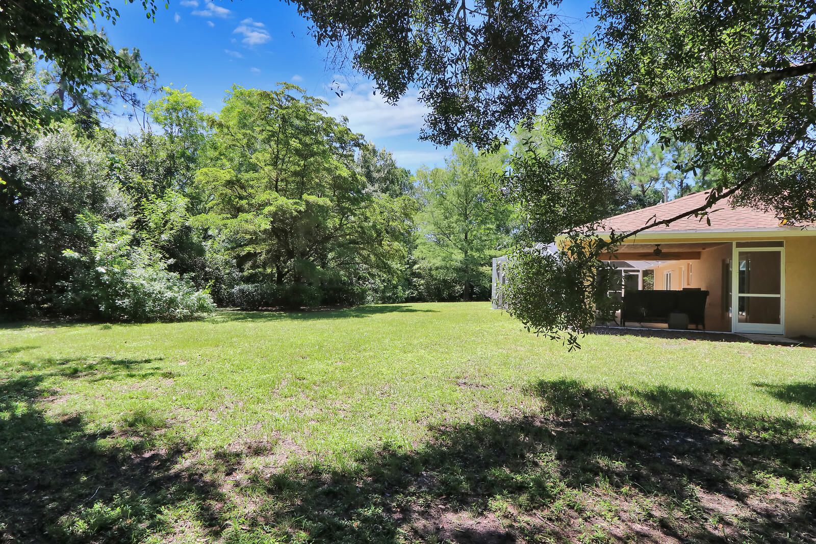 15094 Alexander Run Jupiter, FL 33478 - Photo 47 of 70 tree lined property