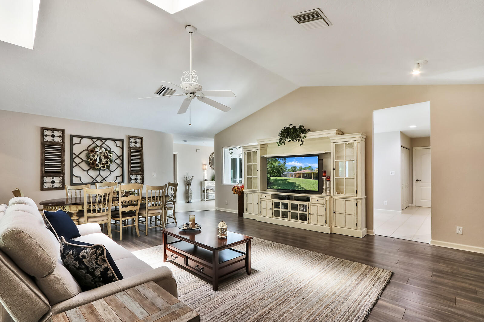 15094 Alexander Run Jupiter, FL 33478 - Photo 8 of 70 Great room with vaulted ceiling