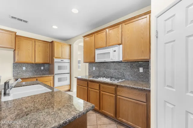 a view of a room with a window and a bathroom
