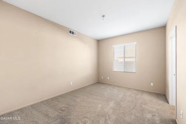 a view of a big room with a chandelier