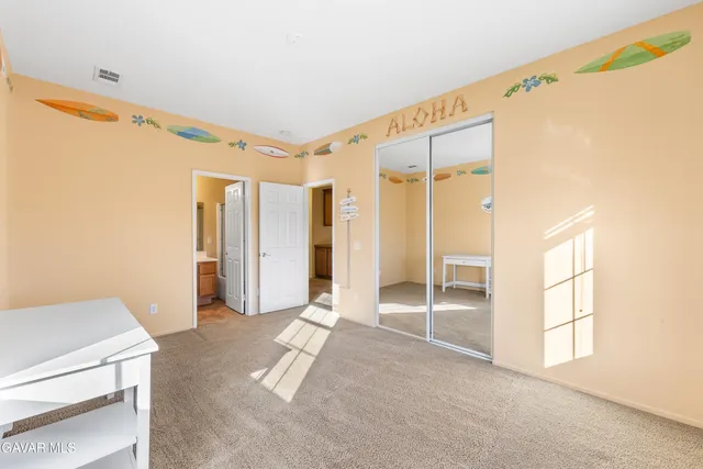 a swimming pool with outdoor seating