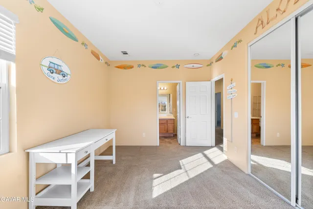 a view of a swimming pool with outdoor seating