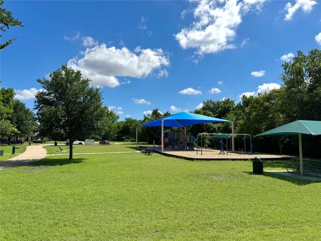 a view of a garden with a slide