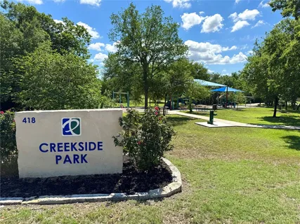 a view of outdoor space with sign board
