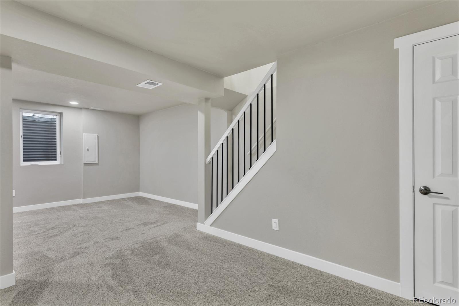 2787 South Helena Way Aurora, CO 80013 - Photo 20 of 26 a view of an entryway with stairs