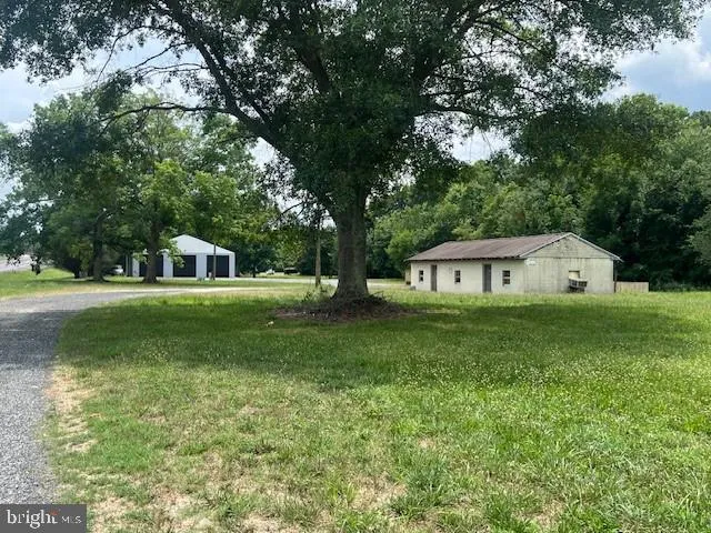 a house view with a garden space