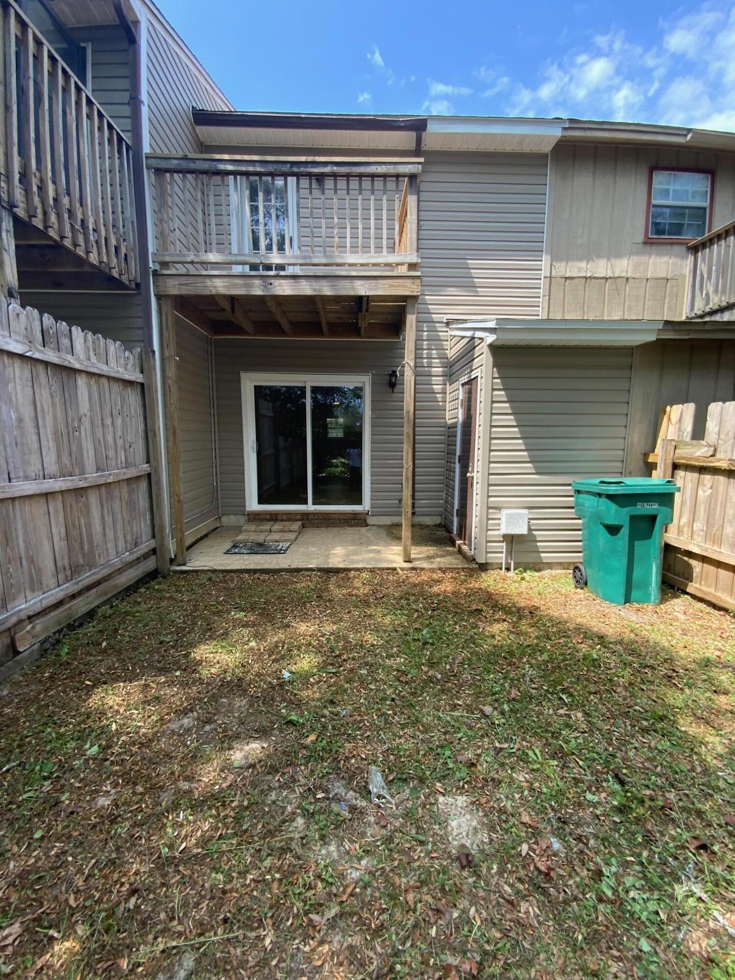 830 Shadow Lane Fort Walton Beach, FL 32547 - Photo 7 of 11 a view of a house with a balcony