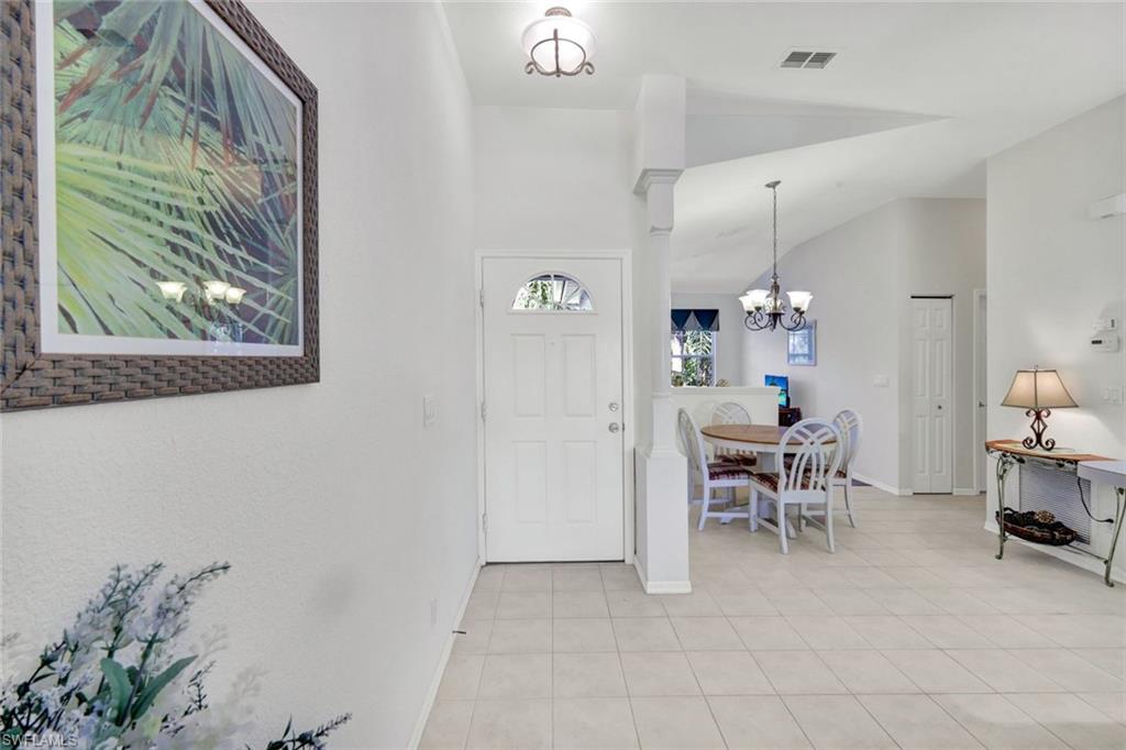 10711 Halfmoon Shoal Road, Unit 203 Estero, FL 34135 - Photo 18 of 25 a view of kitchen with furniture and window