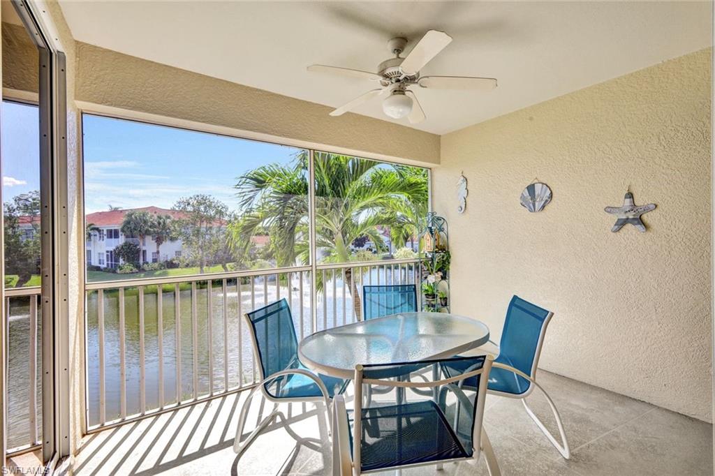 10711 Halfmoon Shoal Road, Unit 203 Estero, FL 34135 - Photo 20 of 25 a view of a dining room with furniture window and outside view
