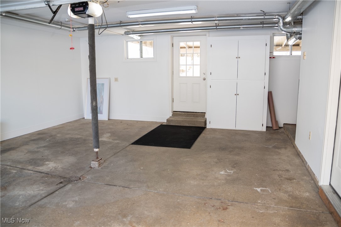 158 Morningside Road Niles, OH 44446 - Photo 27 of 36 Garage featuring a garage door opener