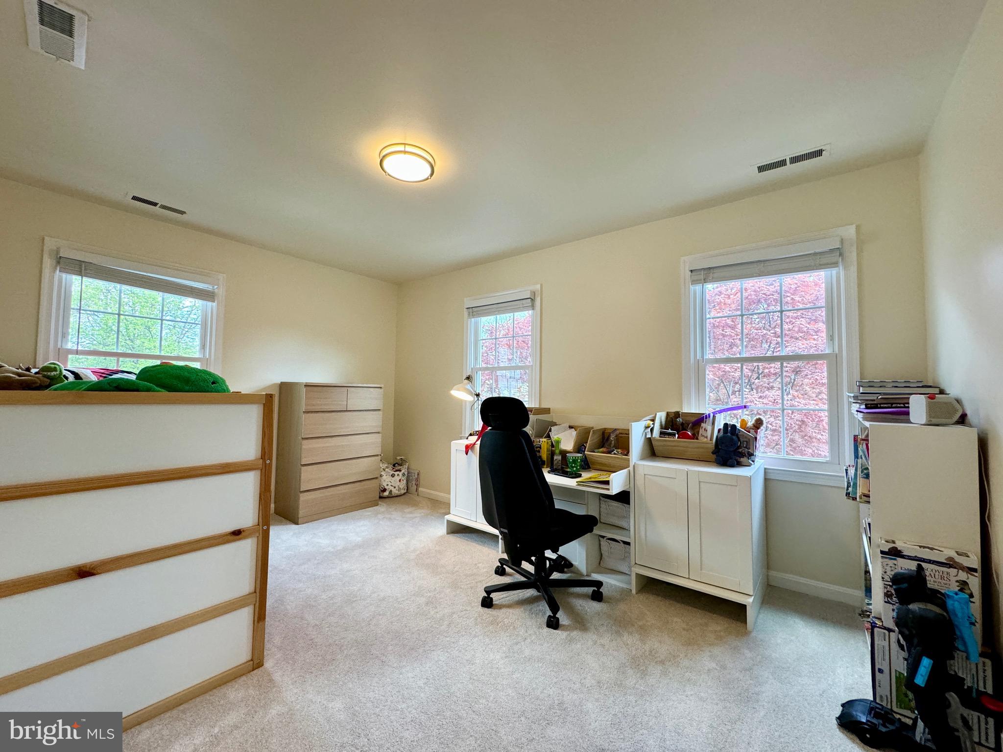 6728 Churchill Road McLean, VA 22101 - Photo 11 of 32 a view of a workspace with furniture and a window