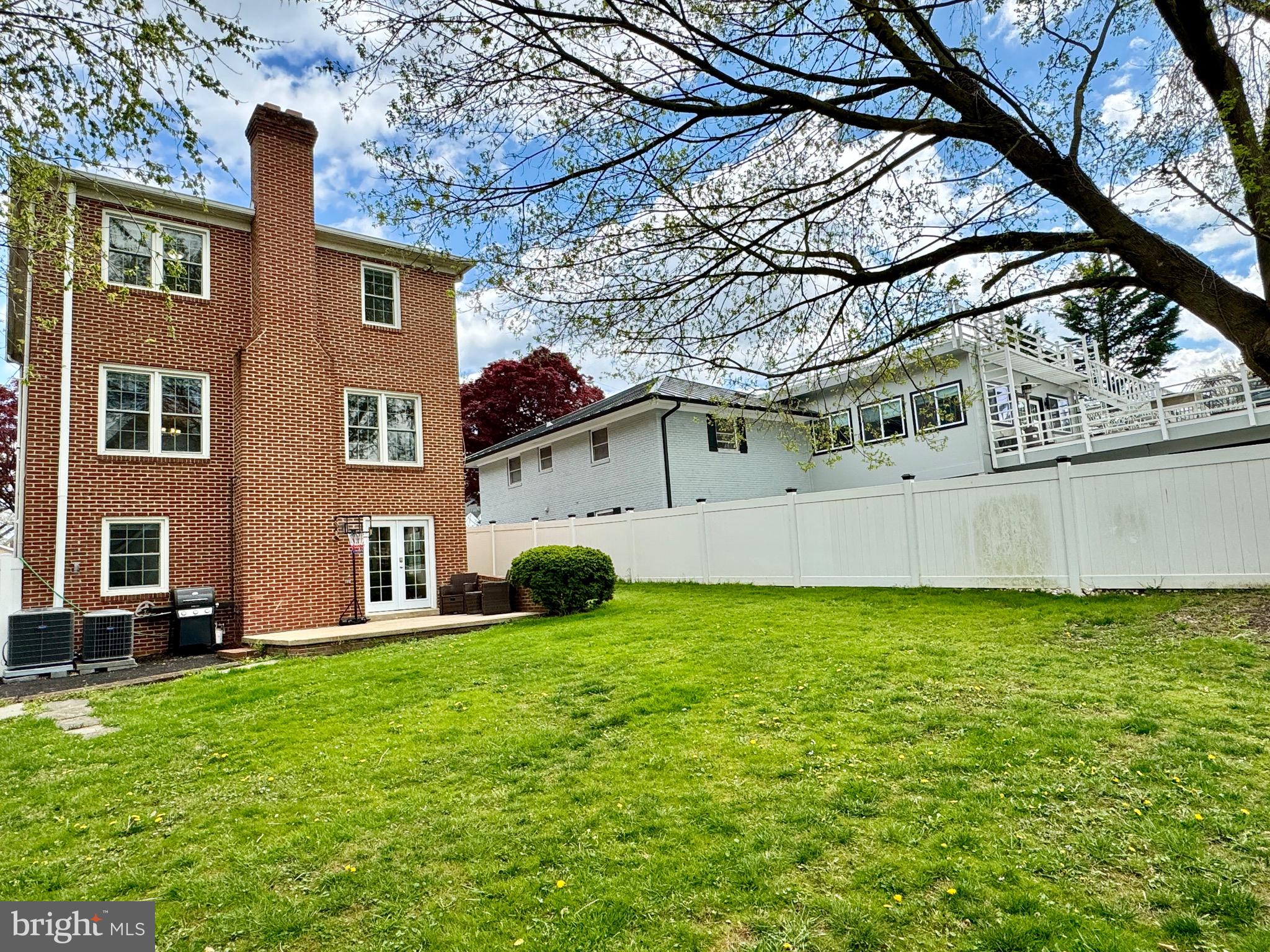 6728 Churchill Road McLean, VA 22101 - Photo 26 of 32 a view of a house with a yard