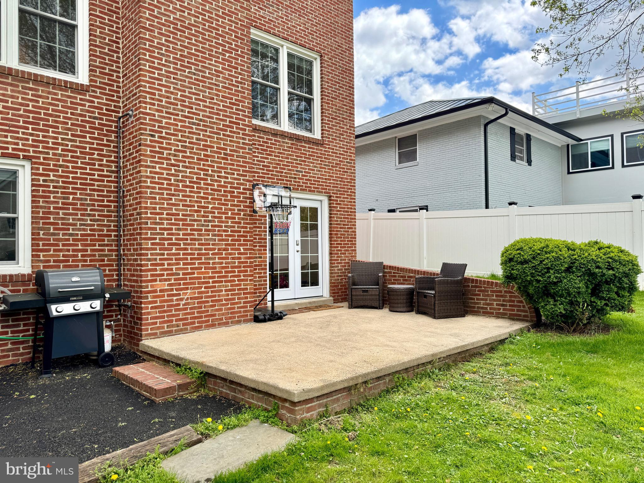 6728 Churchill Road McLean, VA 22101 - Photo 28 of 32 a view of a house with a patio